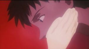 Yui touches Shinji's cheek in a gesture of farewell